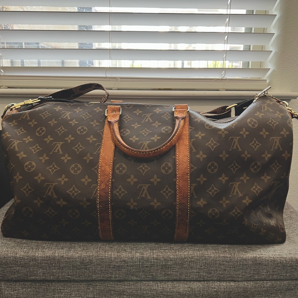 Louis Vuitton Brown Travel Bag with Iconic Monogram Design (55)